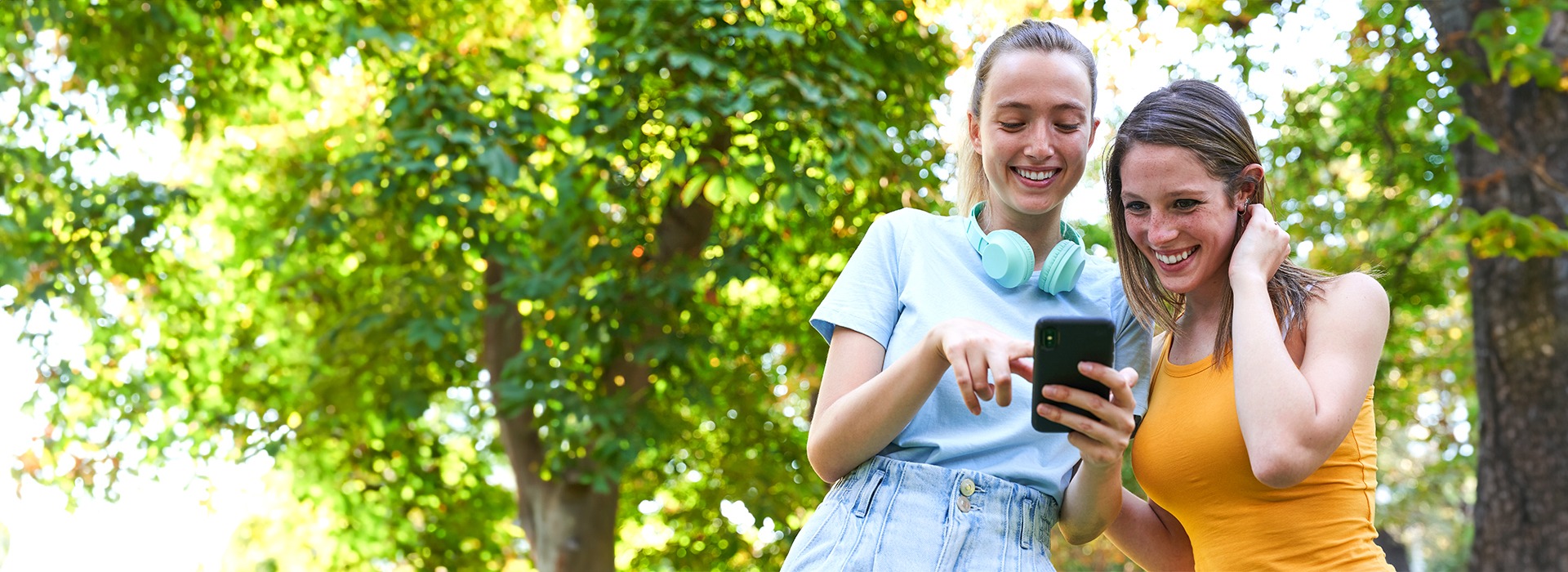 Teenagers looking at phone