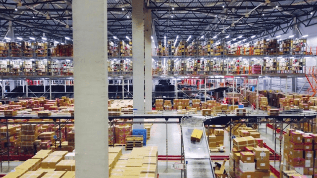 Image of the inside of a large industrial warehouse